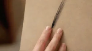 Close-up of tattoo artists precise work